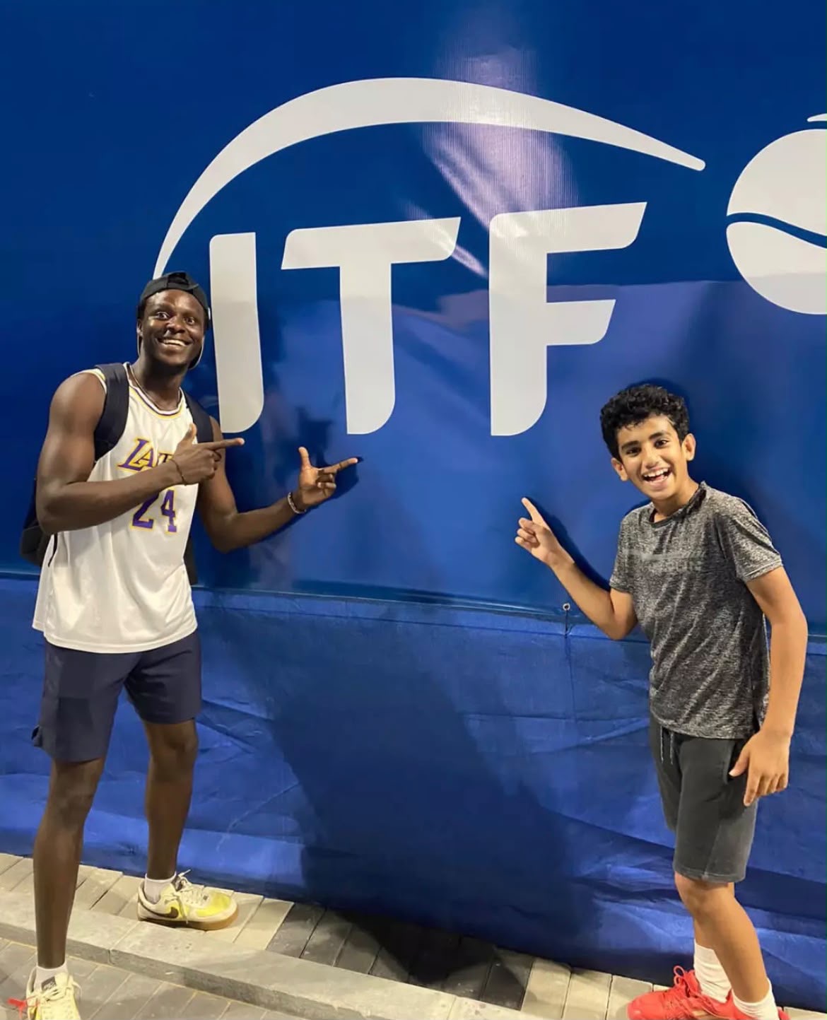 Coach Frank with a junior player at an ITF tournament